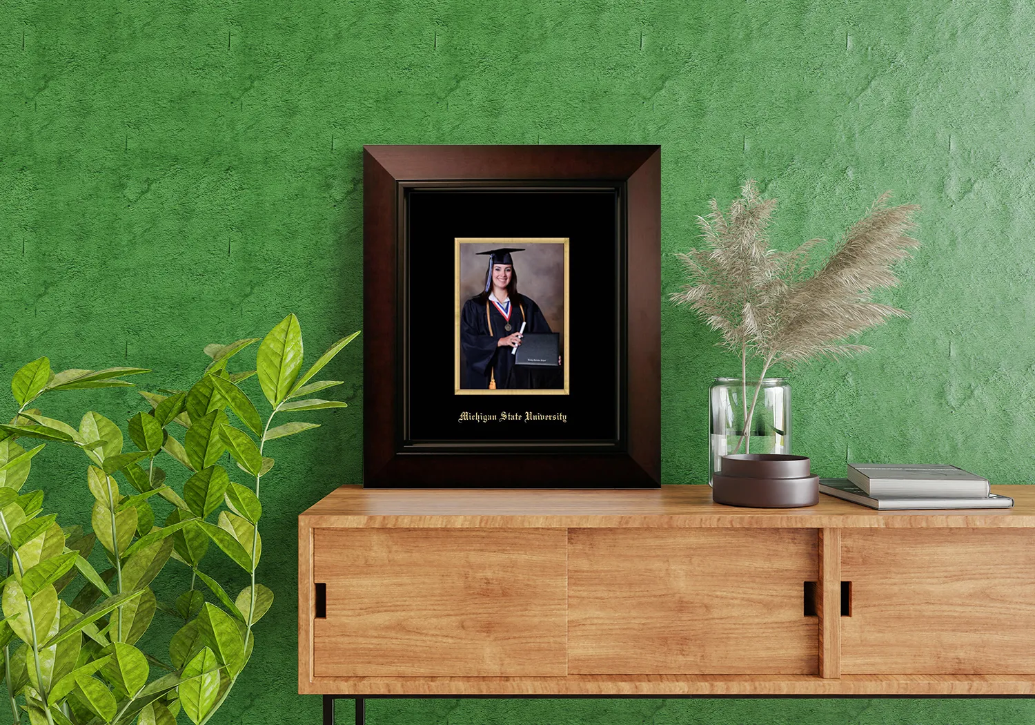 A graduation picture frame placed on a table